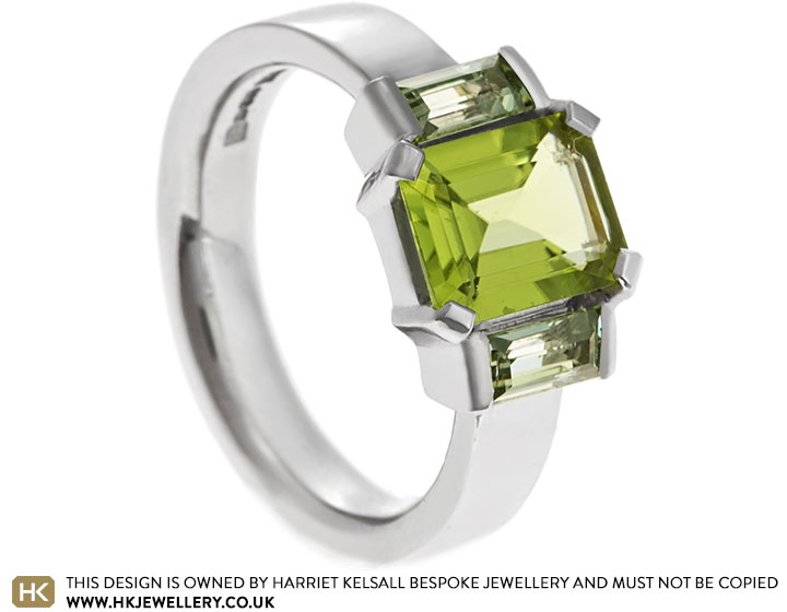 Jennie's emerald cut peridot and green sapphire engagement ring