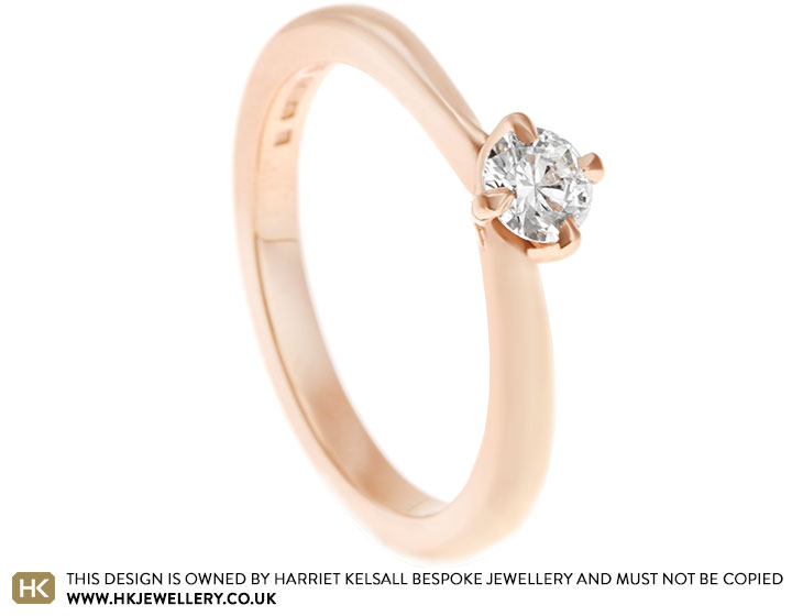 Fairtrade 9 carat rose gold and diamond Mobius twist inspired engagement ring