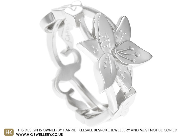 Emma's lily and treble clef inspired wedding ring