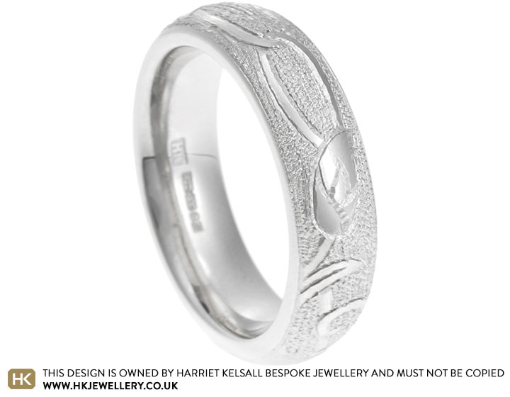 Harry's lily and treble clef inspired wedding ring