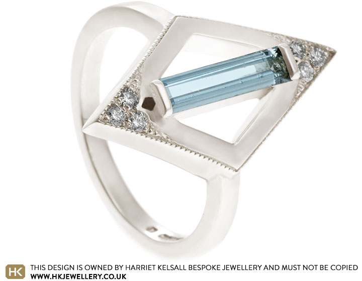 Fairtrade 9 carat white gold dress ring with 0.40ct baguette cut aquamarine and diamonds totalling 0.09ct