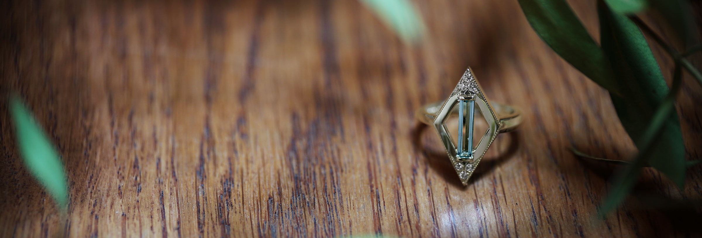 white-gold-diamond-and-baguette-cut-aquamarine-dress-ring