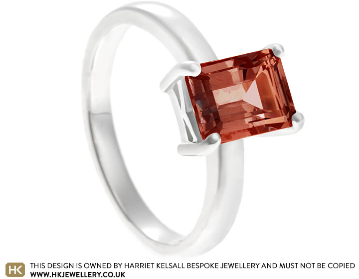 Fairtrade sterling silver ring with emerald cut garnet