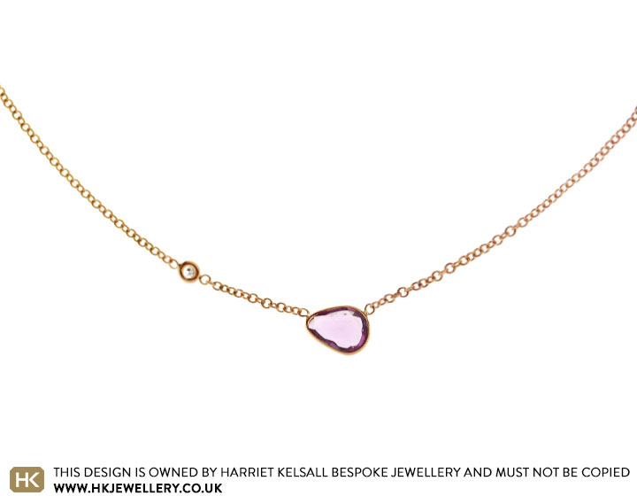 9 carat rose gold necklace with sapphire slice and 0.03ct round brilliant cut G-H VS1 diamond