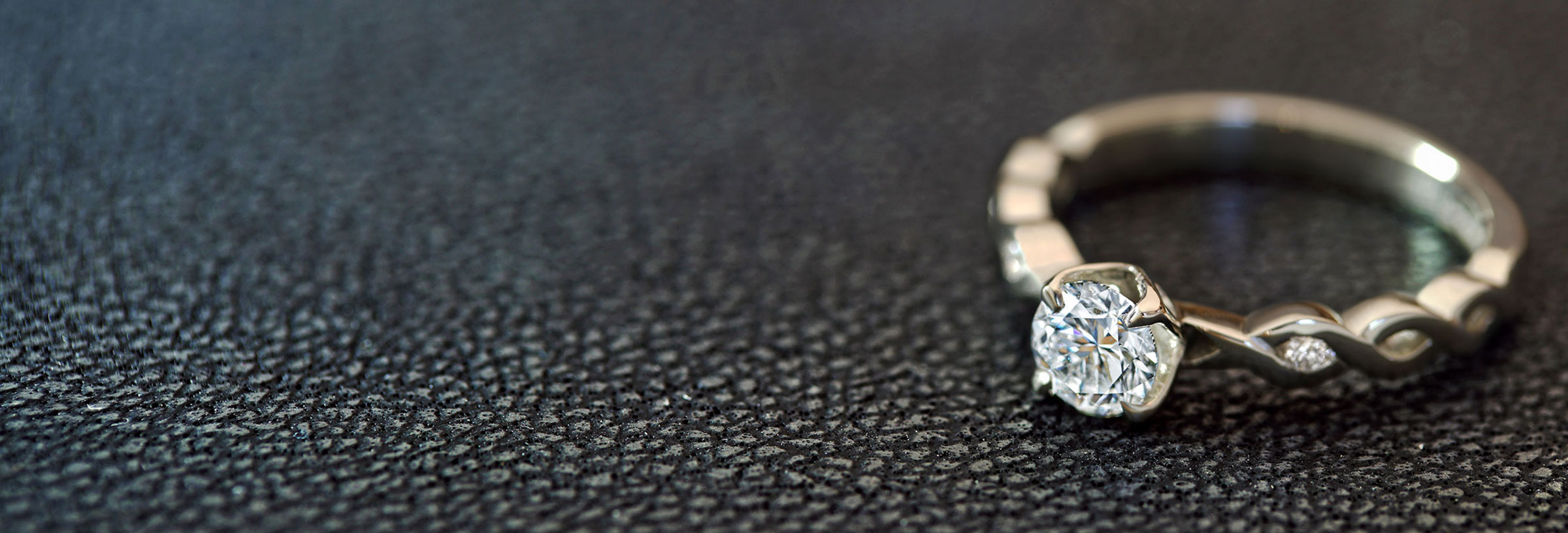 Fairtrade-9-carat-white-gold-woven-engagement