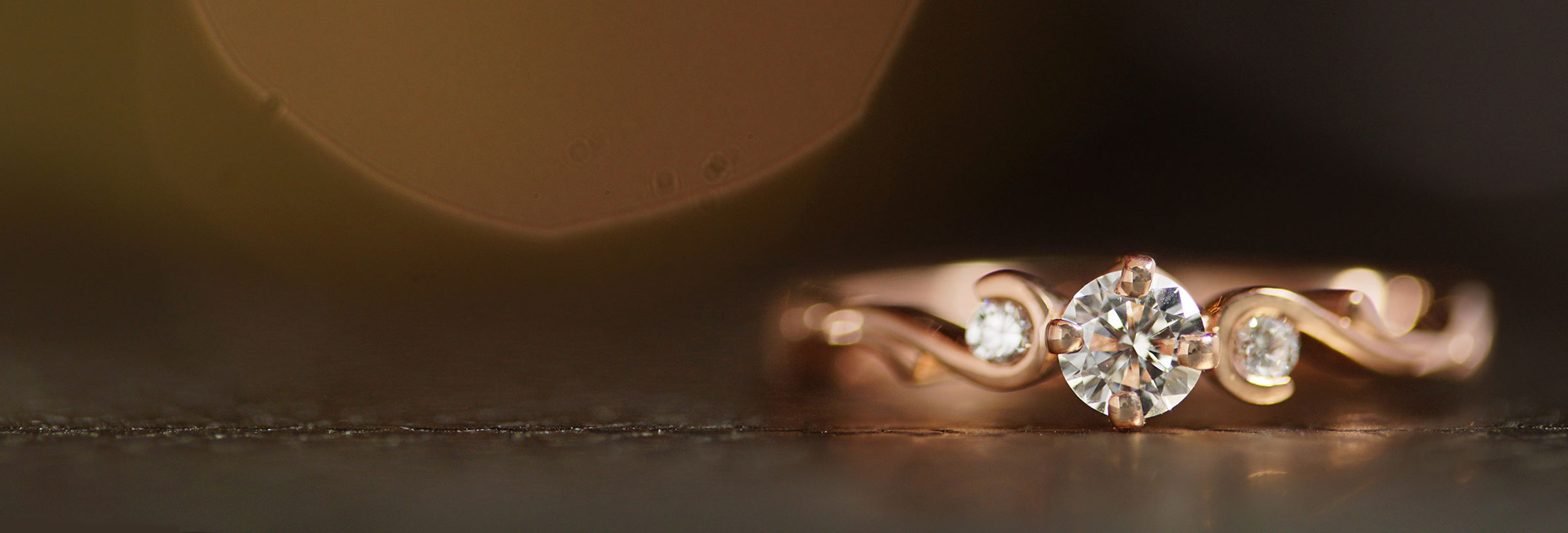 rose-gold-trilogy-style-engagement-with-curl-detail