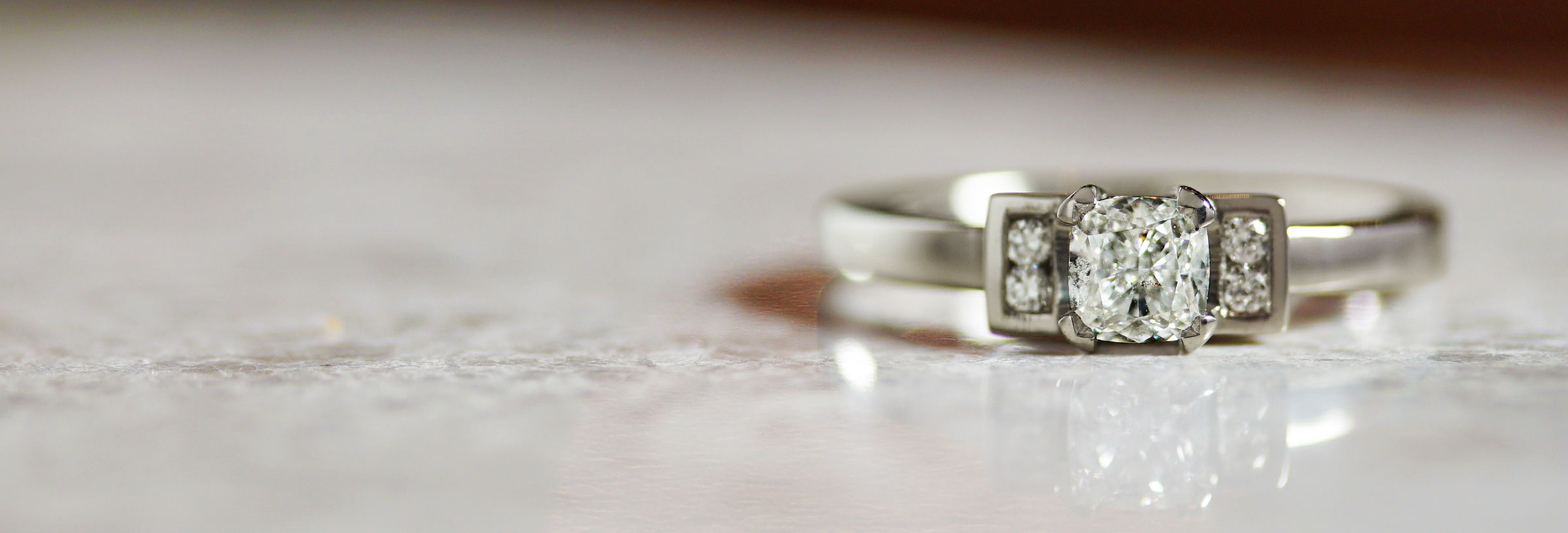 cushion-cut-diamond-and-palladium-five-stone-engagement-ring