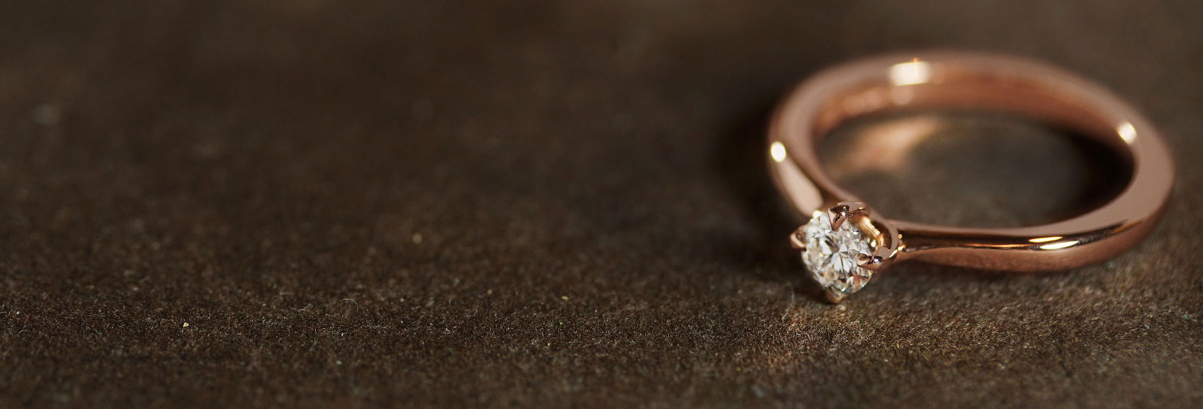 rose-gold-and-diamond-solitaire-mobius-twist-engagement