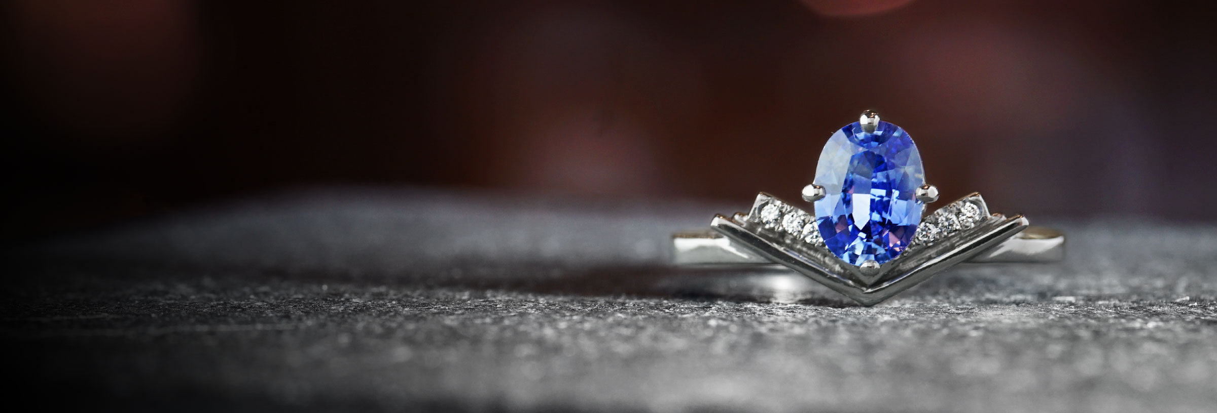 book-inspired-platinum-diamond-and-sapphire-engagement-ring