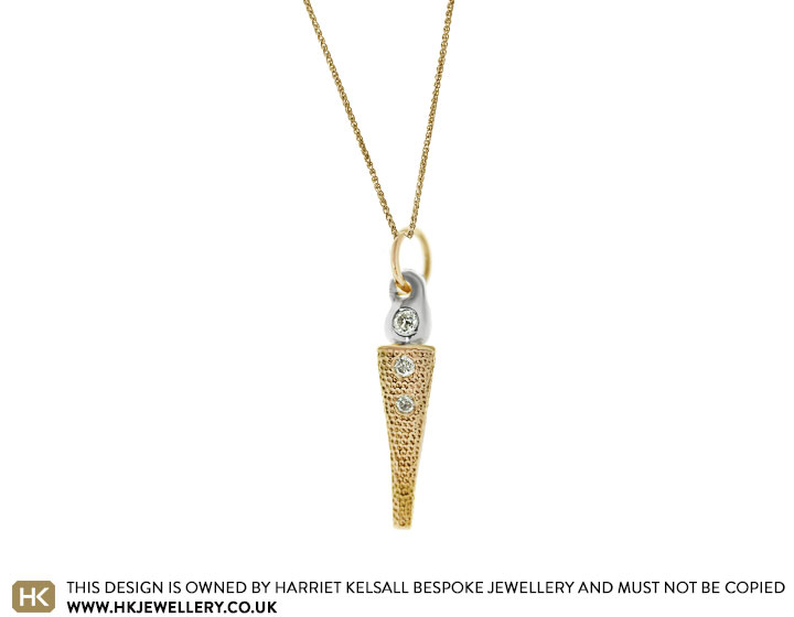 John's Olympic flame inspired 9 carat yellow gold and silver pendant