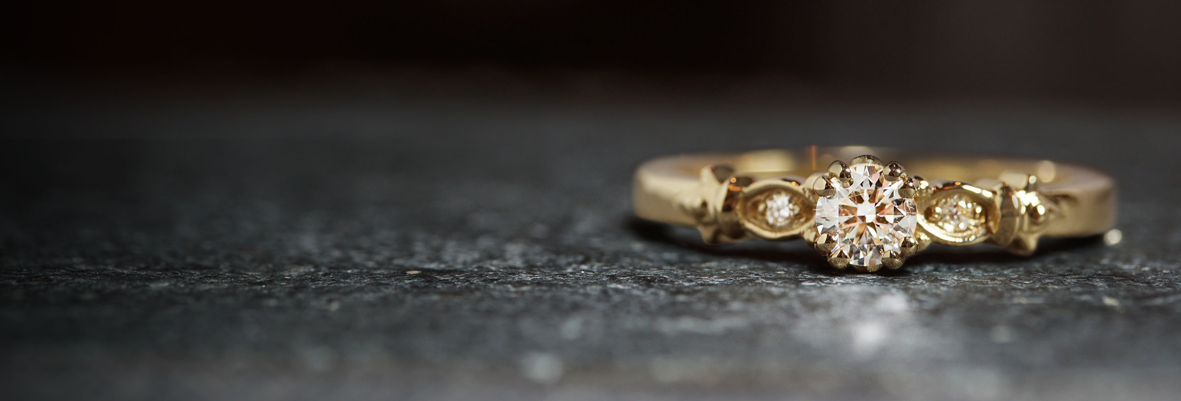 fleur-de-lis-inspired-yellow-gold-and-diamond-engagement-ring