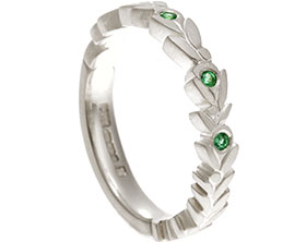 19740-white-gold-leaf-inspired-invisibly-set-emerald-eternity-ring_1.jpg