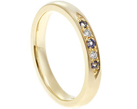 19715-yellow-gold-diamond-and-tanzanite-eternity-ring_1.jpg
