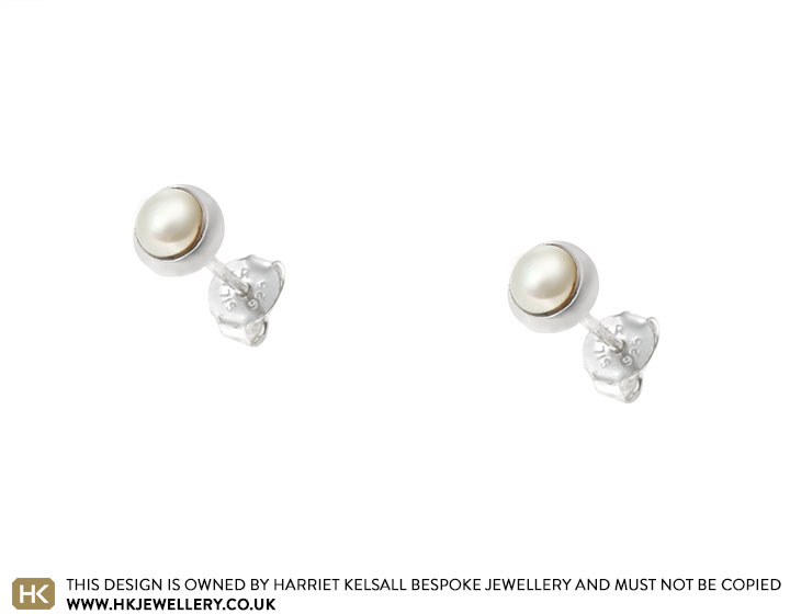 Round sterling silver and ivory pearl stud earrings