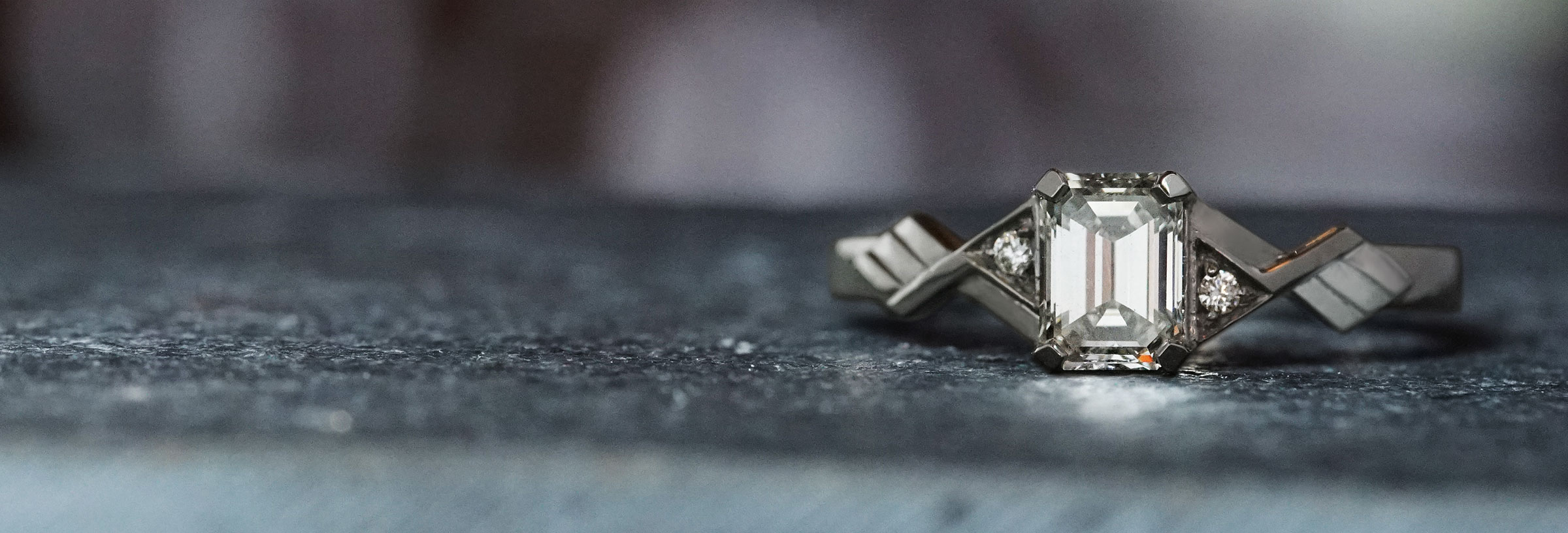 palladium-art-deco-inspired-emerald-cut-diamond-engagement-ring