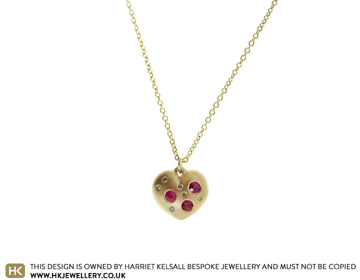 Becky's 9ct Yellow Gold Diamond and Ruby Heart Shaped Pendant