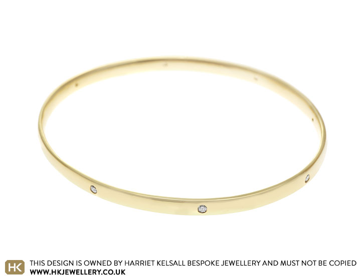 Ruth's 18ct Yellow Gold Bangle with Invisibly Set Diamonds