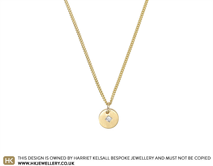 Alex's 9ct yellow gold disc pendant with sentimental diamond