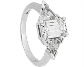 20404-platinum-emerald-and-triangle-cut-diamond-trilogy-engagement-ring_1.jpg