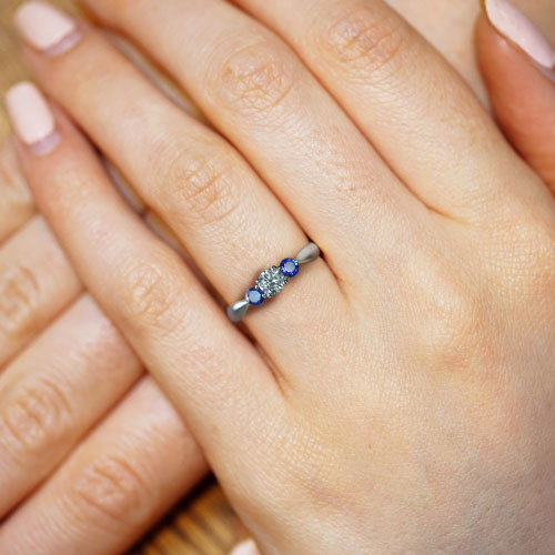 17585-palladium-sapphire-and-diamond-trilogy-engagement-ring_5.jpg