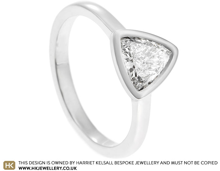 18335-platinum-and-trillion-cut-solitaire-diamond-engagement-ring_2.jpg