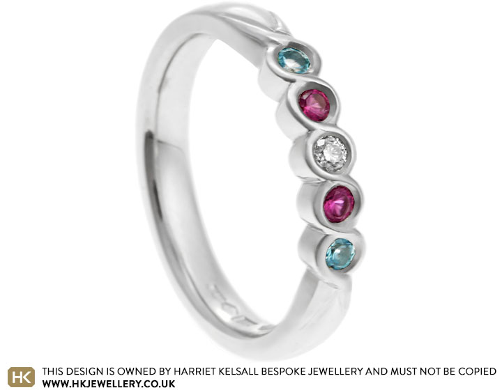 Jenny's Platinum Topaz, Ruby and Diamond Eternity Ring