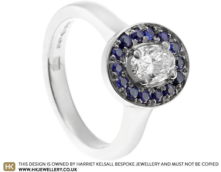 0.61ct Oval Cut Diamond and Sapphire Engagement Ring