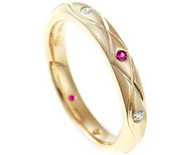 21255-yellow-gold-ruby-and-diamond-celtic-eternity-ring_1.jpg