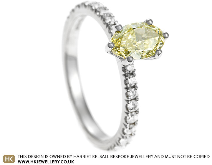 Beth's 0.82ct Oval Yellow Diamond and White Diamond Engagement Ring