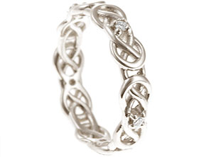 20466-white-gold-and-diamond-celtic-knot-inspired-eternity-ring_1.jpg
