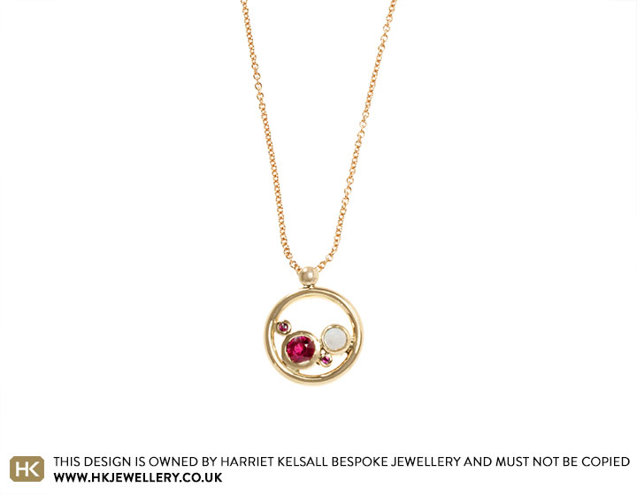 Sarah's 9ct Yellow Gold Ruby and Opal Circular Pendant