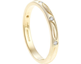 21650-yellow-gold-and-diamond-celtic-inspired-eternity-ring_1.jpg