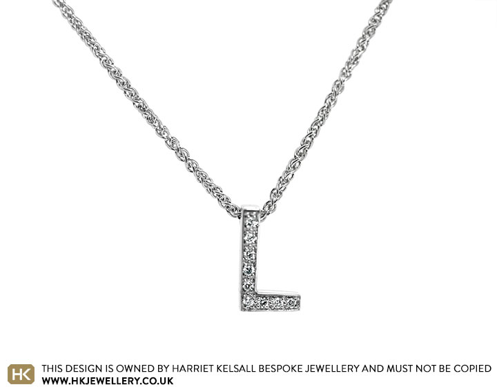 Clare's platinum 'L' Initial Pendant