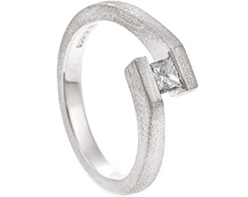 21697-white-gold-and-princess-cut-diamond-tension-set-engagement-ring_1.jpg