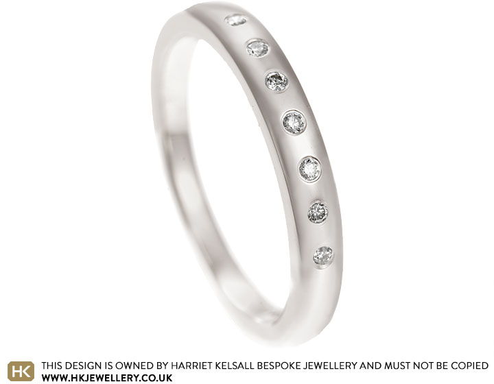 Emily's White Gold Eternity Ring With Seven Diamonds