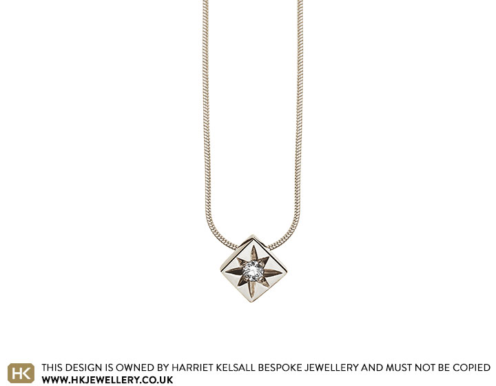 9 Carat White Gold Pendant with a Star Set Diamond