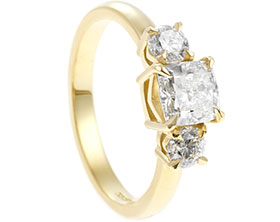 22285-yellow-gold-and-cushion-cut-diamond-trilogy-engagement-ring_1.jpg