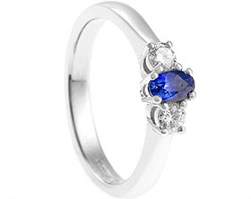 22290-platinum-diamond-and-sapphire-trilogy-style-engagement-ring_1.jpg