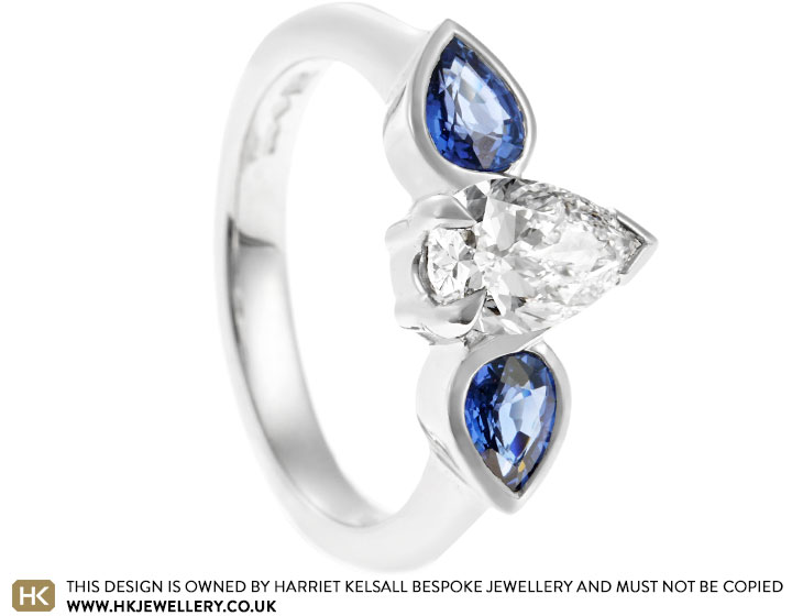 Susan's Surprise Platinum, Diamond and Sapphire Engagement Ring