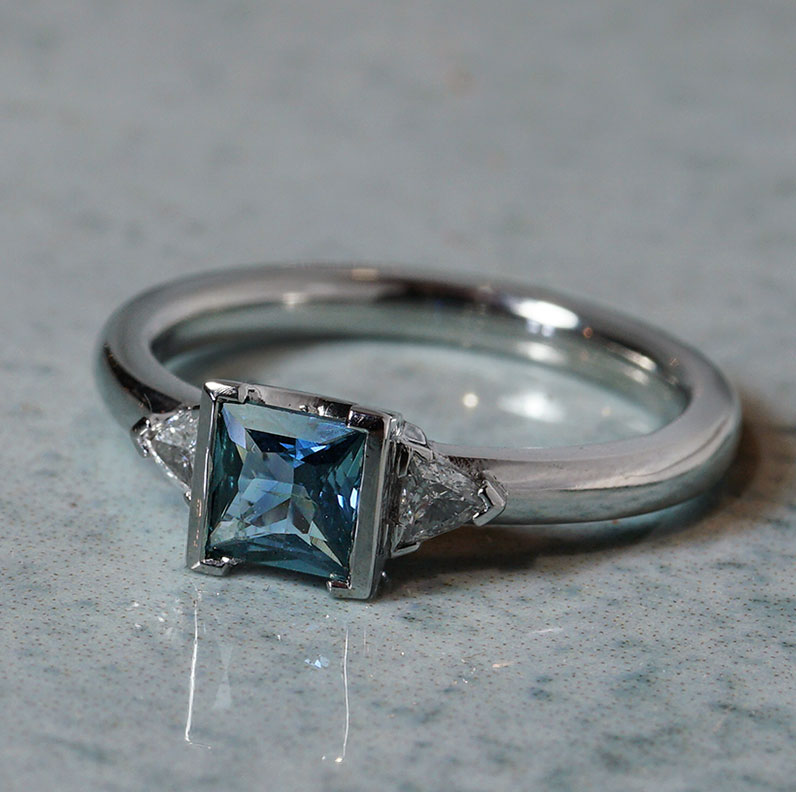 21629-platinum-trilliant-cut-diamond-and-fancy-cut-sapphire-trilogy-engagement-ring_9.jpg