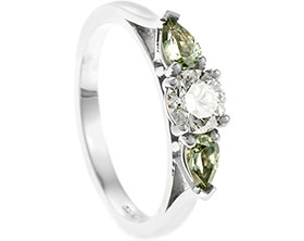 22850-platinum-diamond-and-pear-cut-green-sapphire-trilogy-engagement-ring_1.jpg