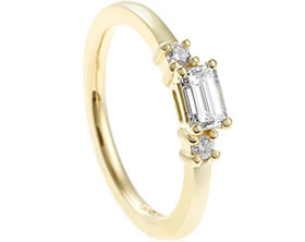 22882-fairtrade-yellow-gold-engagement-ring-with-emerald-cut-and-brilliant-cut-diamonds_1.jpg