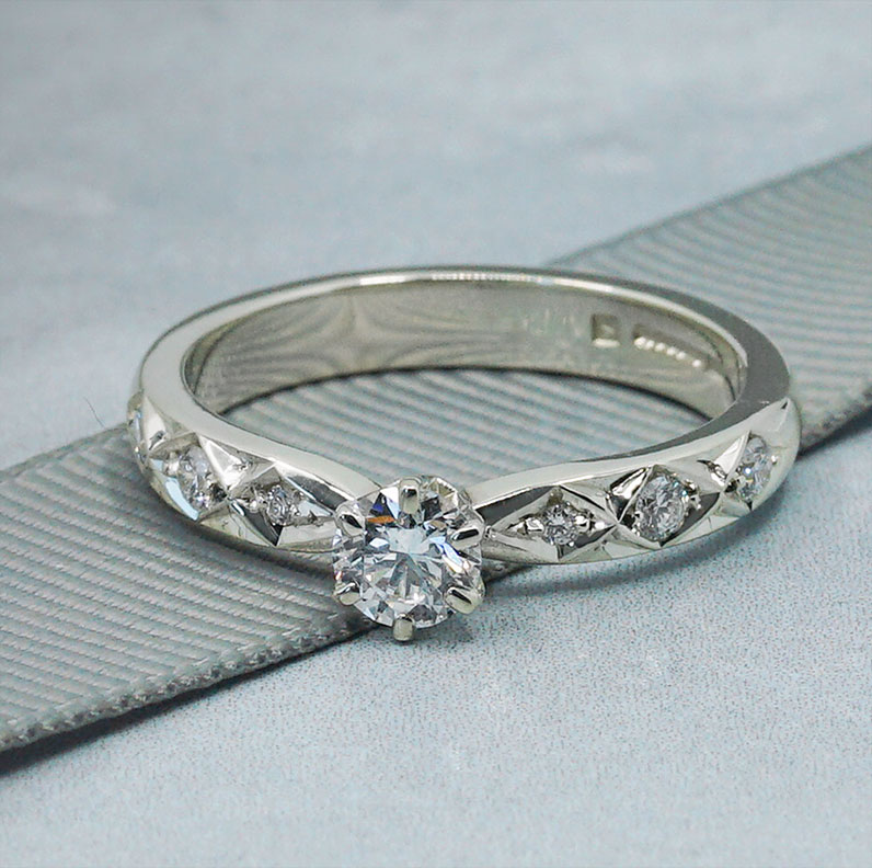 22965-fairtrade-white-gold-and-diamond-celtic-inspired-engagement-ring_9.jpg