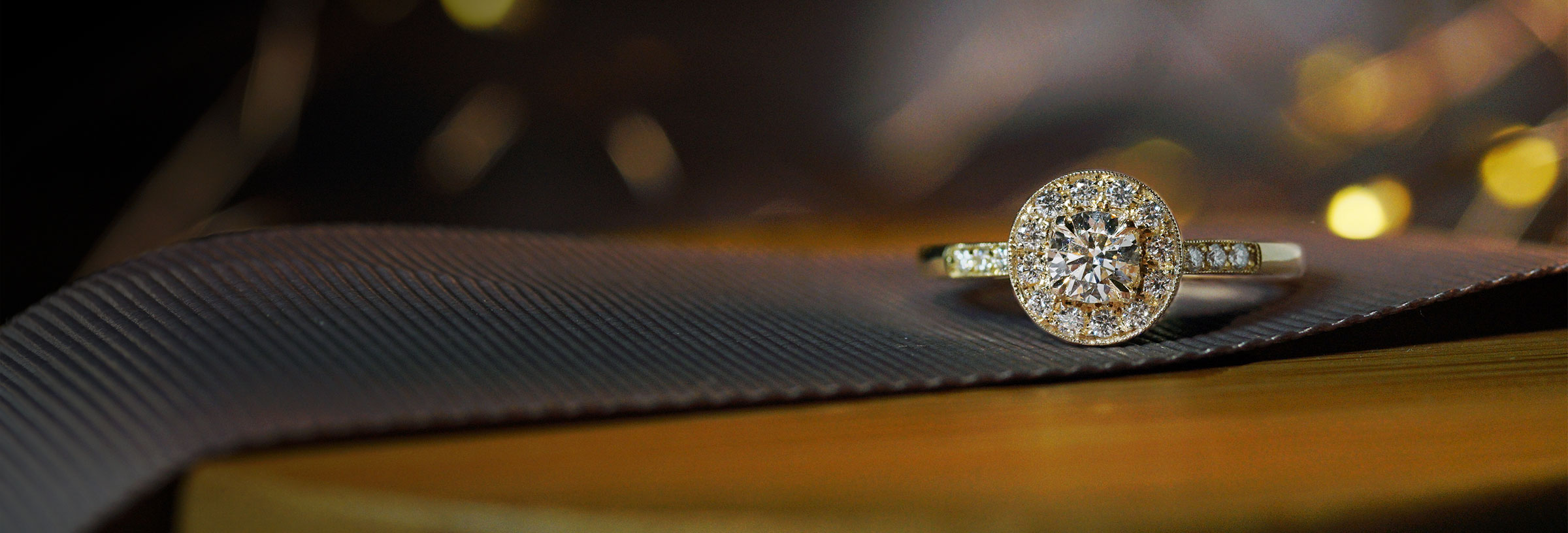 fairtrade-yellow-gold-diamond-engagement-ring-with-halo