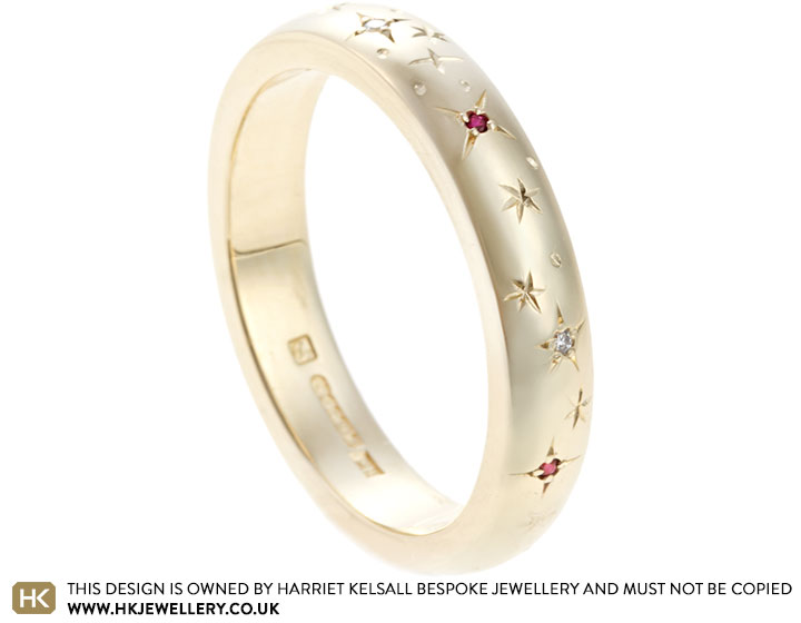 22957-fairtrade-yellow-gold-eternity-ring-with-star-set-rubies-and-diamonds_2.jpg