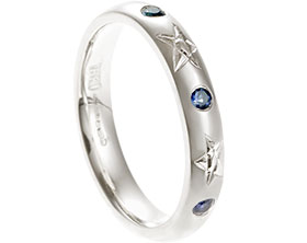 22967-white-gold-eternity-ring-with-sapphires-and-star-shaped-engraving_1.jpg