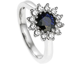 23144-platinum-dress-ring-with-blue-sapphire-and-twelve-diamond-halo_1.jpg
