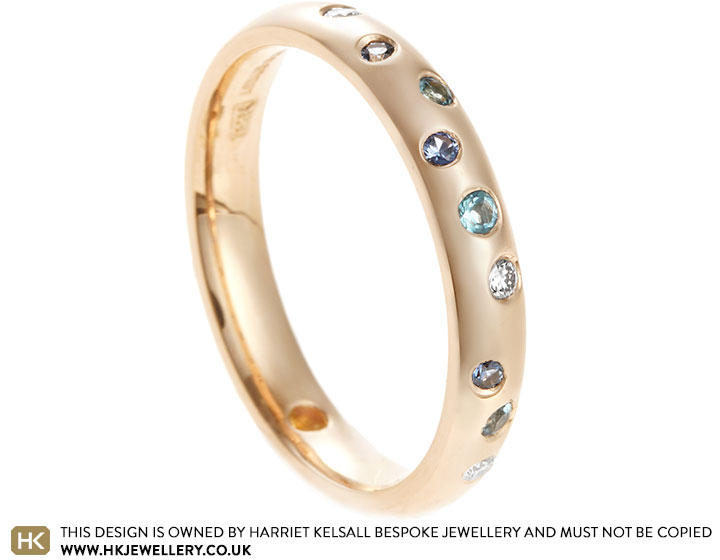 Claire's 18 carat rose gold mixed gemstone eternity ring