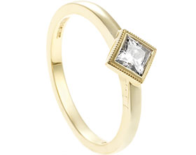 23235-fairtrade-yellow-gold-engagement-ring-with-square-cut-moissanite-with-big-dipper-engraving_1.jpg