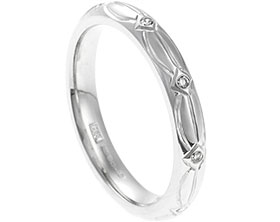 22993-platinum-and-diamond-eternity-ring-with-celtic-knot-inspired-engraving_1.jpg